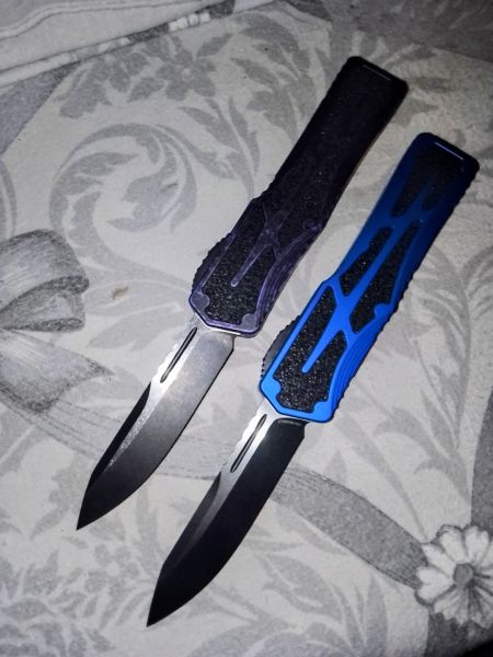 Nóż automatyczny OTF Heretic Colossus SE Breakthrough Purple Aluminum, Two Tone Black Battleworn MagnaCut by Tony Marfione Jr.