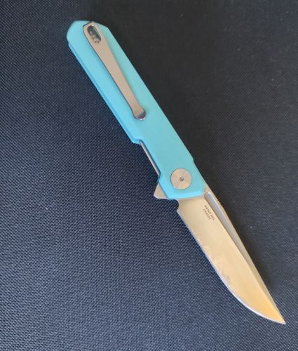 Nóż składany Bestechman Mini Dundee Light Blue G10, Stonewashed / Satin D2 by Ostap Hel (BMK03C)