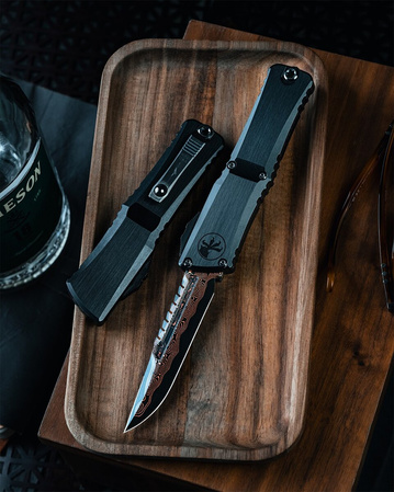 Nóż automatyczny OTF Microtech Custom Combat Troodon LT Interceptor Signature Black Aluminium, Baker Forge Raindrop CopperMai Damascus by Tony Marfione (1217-16MS1)